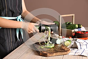 Woman making zucchini spaghetti