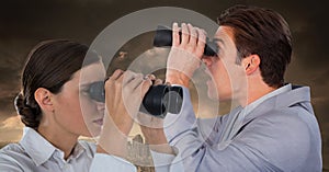 Woman and Man with binoculaurs in cityscape