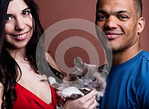 Woman man and cat and here is the family