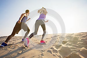 Woman and man during endurance training outdoors photo