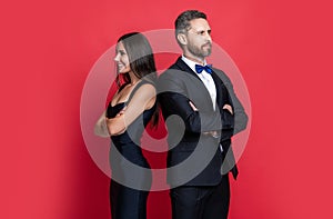 Woman and man at occasion date. Romantic love. Valentines day. Elegantly dressed couple. Formal man and woman. Couple is