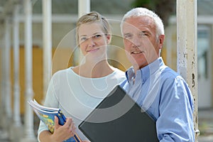 Woman and man professors posing photo