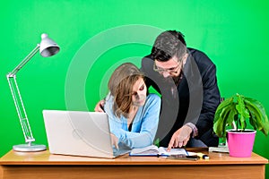 Woman and man work in office at laptop. businessman and assistant solve problem. data. Team brainstorming. business