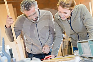 Woman and man in workshop