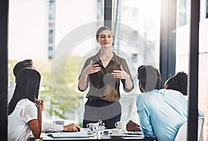 Woman, manager and business meeting in office with collaboration, ideas or communication with employees. Female leader