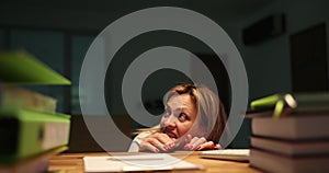 Woman manager crawls out from under table in office and afraid of thunderstorm 4k movie