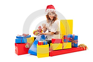 Woman with many Christmas gifts