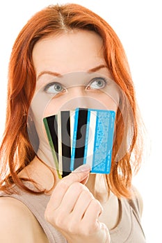 Woman with many different credit cards.