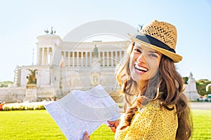 Woman with map examining attractions in rome