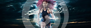 Woman marathon runner. Strong athletic sprinter, running on dark background wearing in sportswear. Energy fitness and