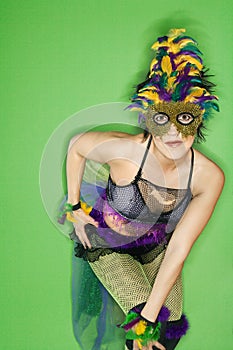 Woman in Mardi Gras costume.