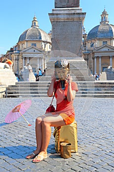 Woman in mask of Egyptian pharaoh