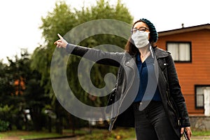 woman with mask looking for locomotion