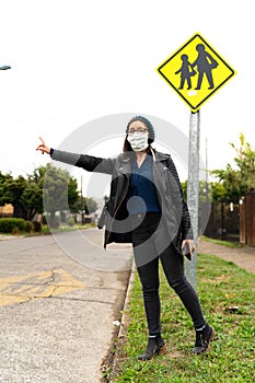 Woman with mask looking for locomotion