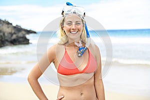 Woman with mask for snorkling at the seaside