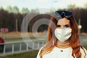 Woman in mask on the street