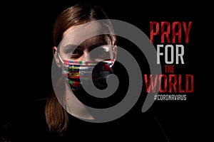 Woman with mask for virus protection with text Pray for the World