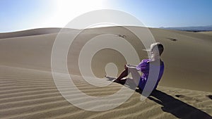 woman in Maspalomas Dunes of Gran Canaria