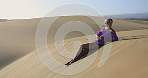 woman in Maspalomas Dunes of Gran Canaria