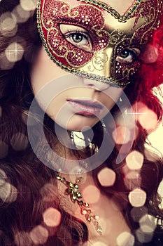 Woman in masquerade mask