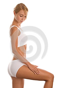 Woman massaging her leg