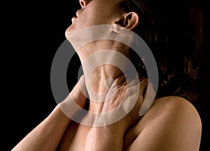 Woman massaging her neck