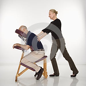 Woman massaging man. photo