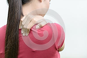 Woman massaging pain back