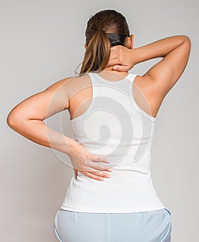 Woman massaging pain back