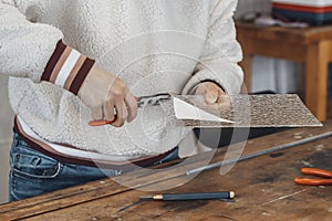woman master glassmaker at work in a workshop