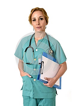 Woman md emergency doctor or nurse posing serious with stethoscope