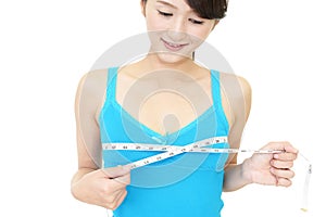 Woman measuring chest