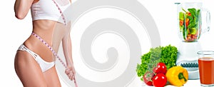 Woman measuring her body with a measure tape. Diet concept, fresh vegetables