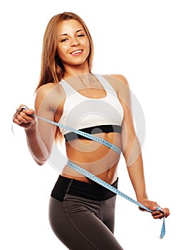 Woman measuring her waistline . Perfect Slim Body