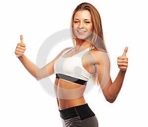 Woman measuring her waistline . Perfect Slim Body. Over white background