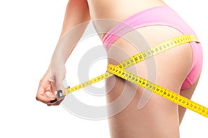 Woman Measuring Perfect Shape Of Beautiful Hips photo