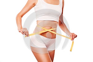 Woman measuring perfect shape. Healthy lifestyles