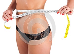 Woman measuring shape of beautiful thigh healthy.