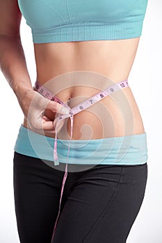 Woman Measuring Slim Waist