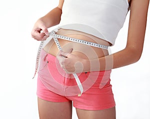 Woman measuring waist