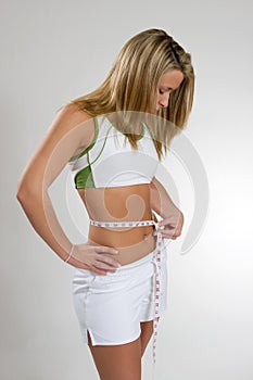 Woman Measuring Waist