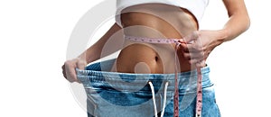 Woman is measuring waist after weight loss,. Diet concept