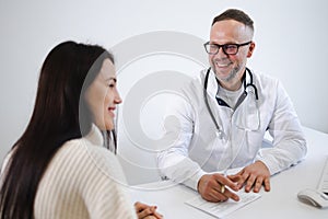 Woman during medical examination in doctor`s office.