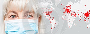 Woman in a medical mask on the background of the epicenter of the epidemic world map. Fatalities from a strain of virus