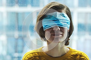 Woman in medical mask on eyes