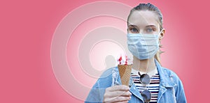 Woman in medical mask with ice cream in hand