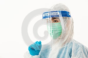 Woman medical staff doctor in PPE uniform wearing a face mask protective and plastic face shield