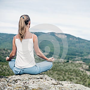 Woman Meditate at the Mountains