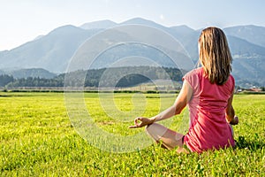 Woman Meditate at the Mountains
