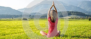 Woman Meditate at the Mountains